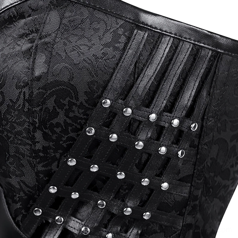 Close-up detail of black jacquard fabric corset strap with faux leather trim and studded lattice design