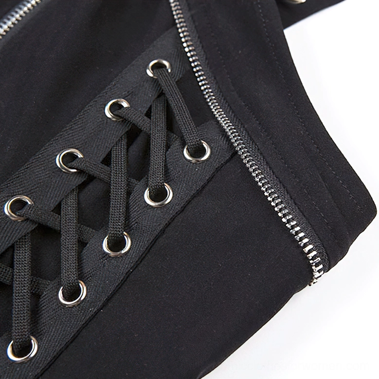 Detailed view of black gothic crop corset top neckline and choker integration with stand collar design and rivet hardware accents