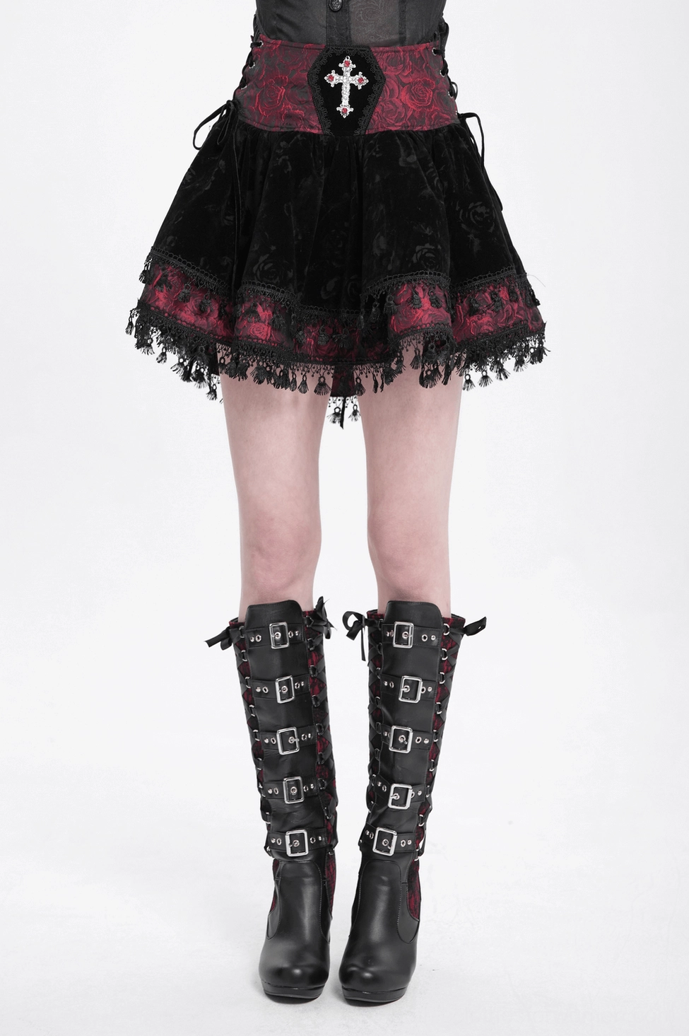Gothic skirt front detail showing corset-style waist lace-up closure and cross embellishment
