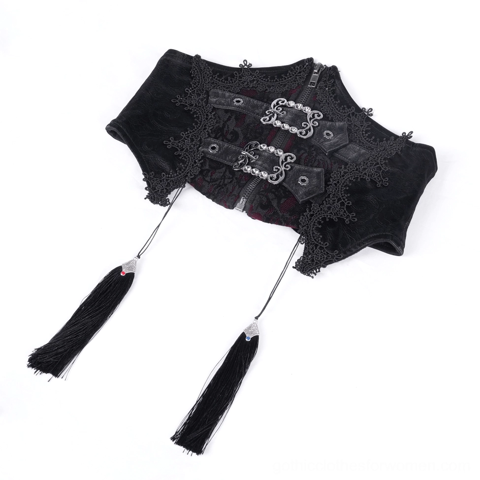 Oblique angle flat lay of gothic corset waist piece with embossed fabric vintage buckles