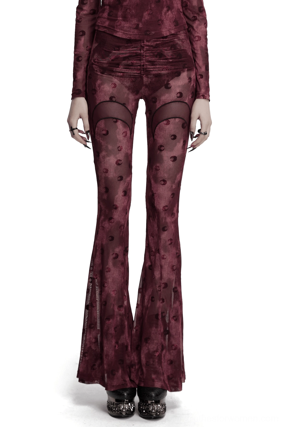 Gothic crescent moon mesh flare pants in wine red front full body view on model