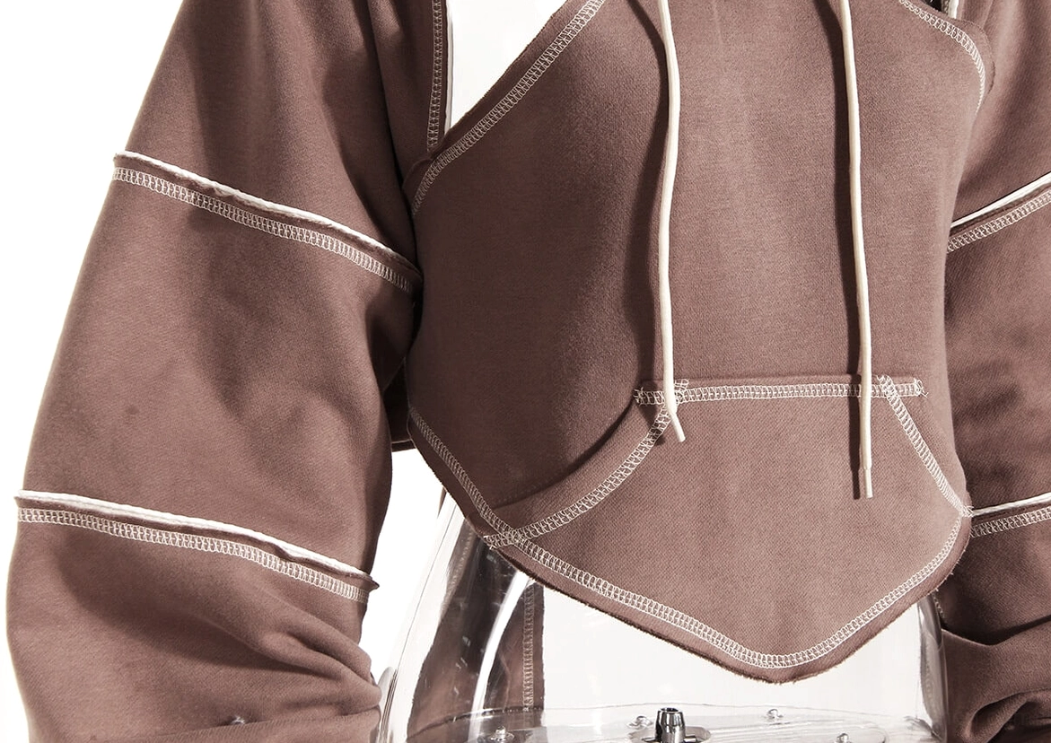 Gothic crop hoodie side profile view on model showing cropped length and sleeve proportion