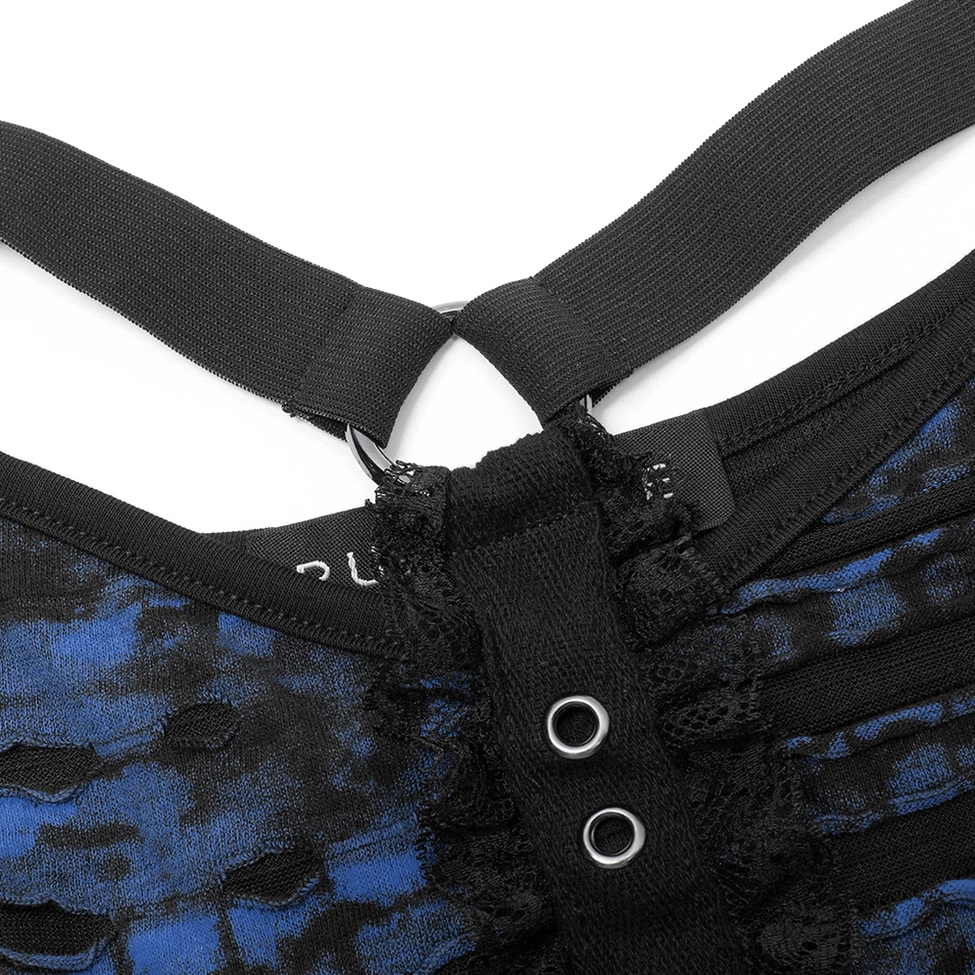 Close-up of gothic crop tee hardware, metal eyelets, black harness straps, and lace trim details