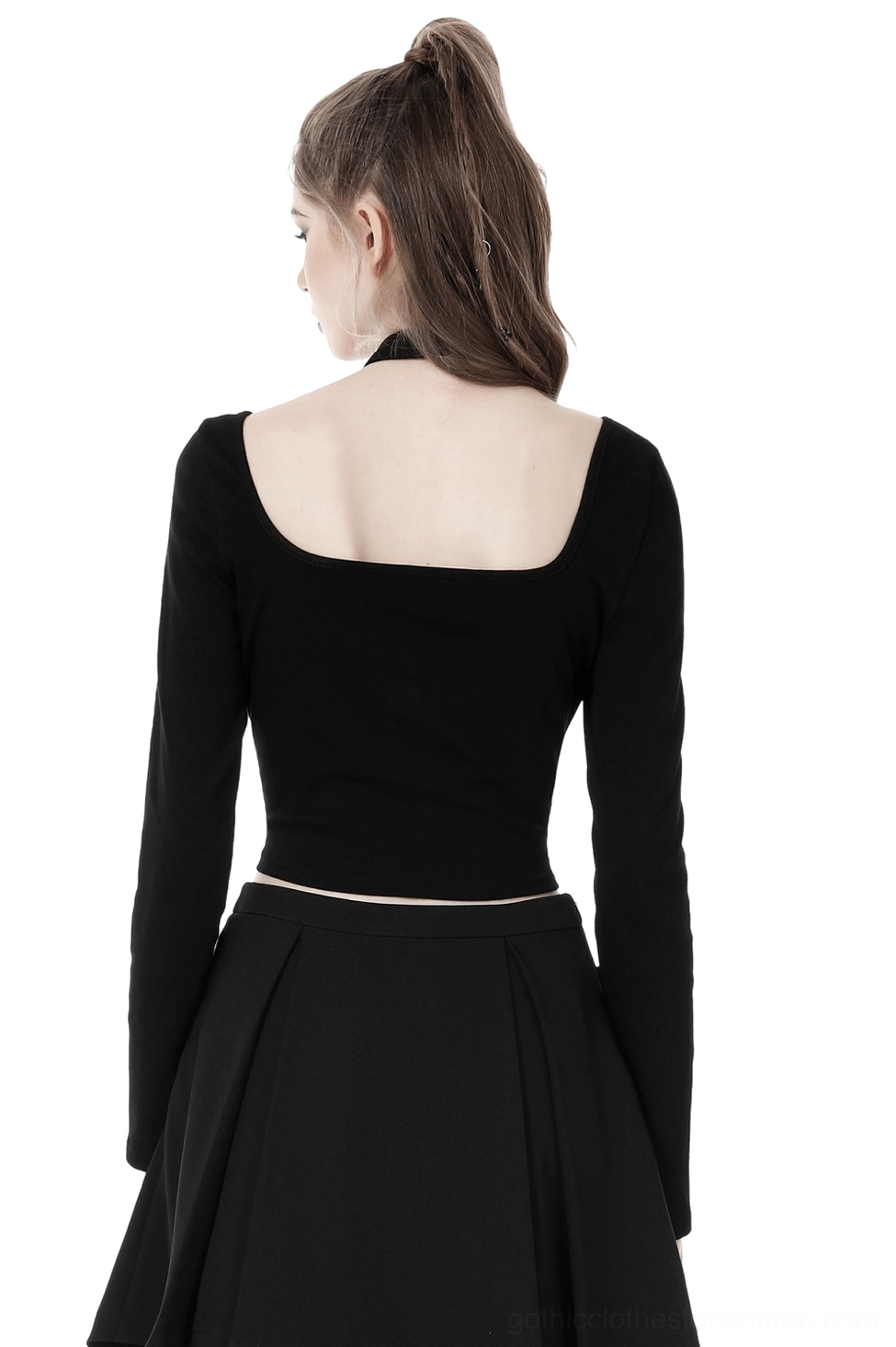 Black gothic crop top long sleeves back view, square neckline design, model wearing alternative goth fashion
