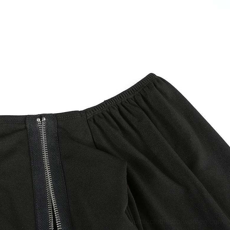 Gothic crop top with chain and zipper decoration styled flat lay