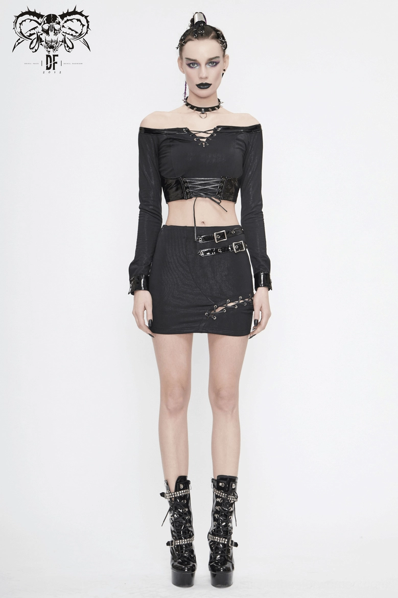 Detail view of gothic crop top demonstrating corset-style construction and patent leather waist detail