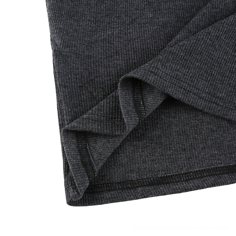 Fabric texture detail of gothic crop top showing dark grey ribbed stretch knit material quality flat lay