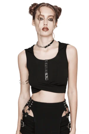 Black gothic hooded crop top with pleated cross design and front snap button closure, worn by female model with space buns in front view studio shot