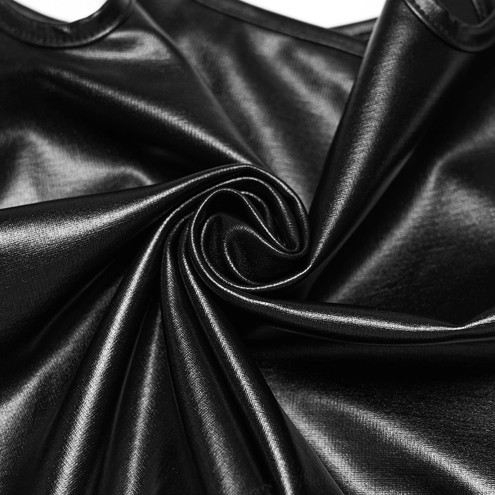 Black rubberized gothic crop top styling detail with metallic accents and industrial techwear aesthetic