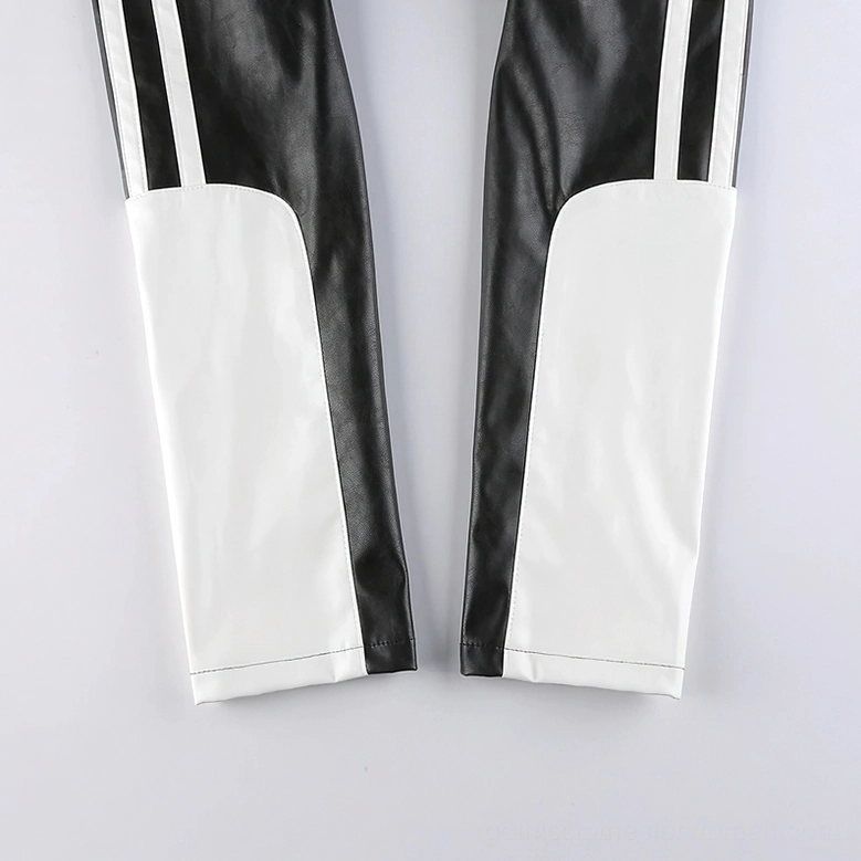 Back detail view of cropped gothic patchwork leather jacket highlighting rear silhouette and patch placement