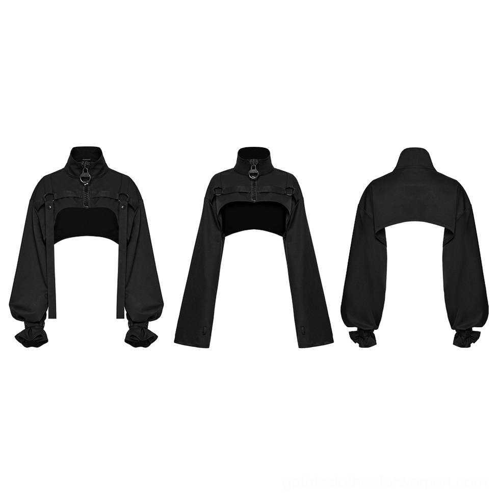 Multiple black gothic cropped jackets with metal hardware and ribbon straps flat lay front view