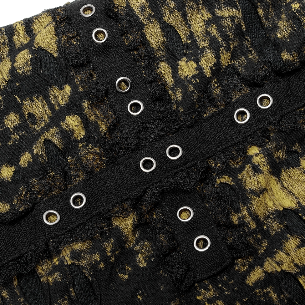 Full product display of black and yellow distressed gothic knit mini skirt with cross motif and deconstructed mesh panels