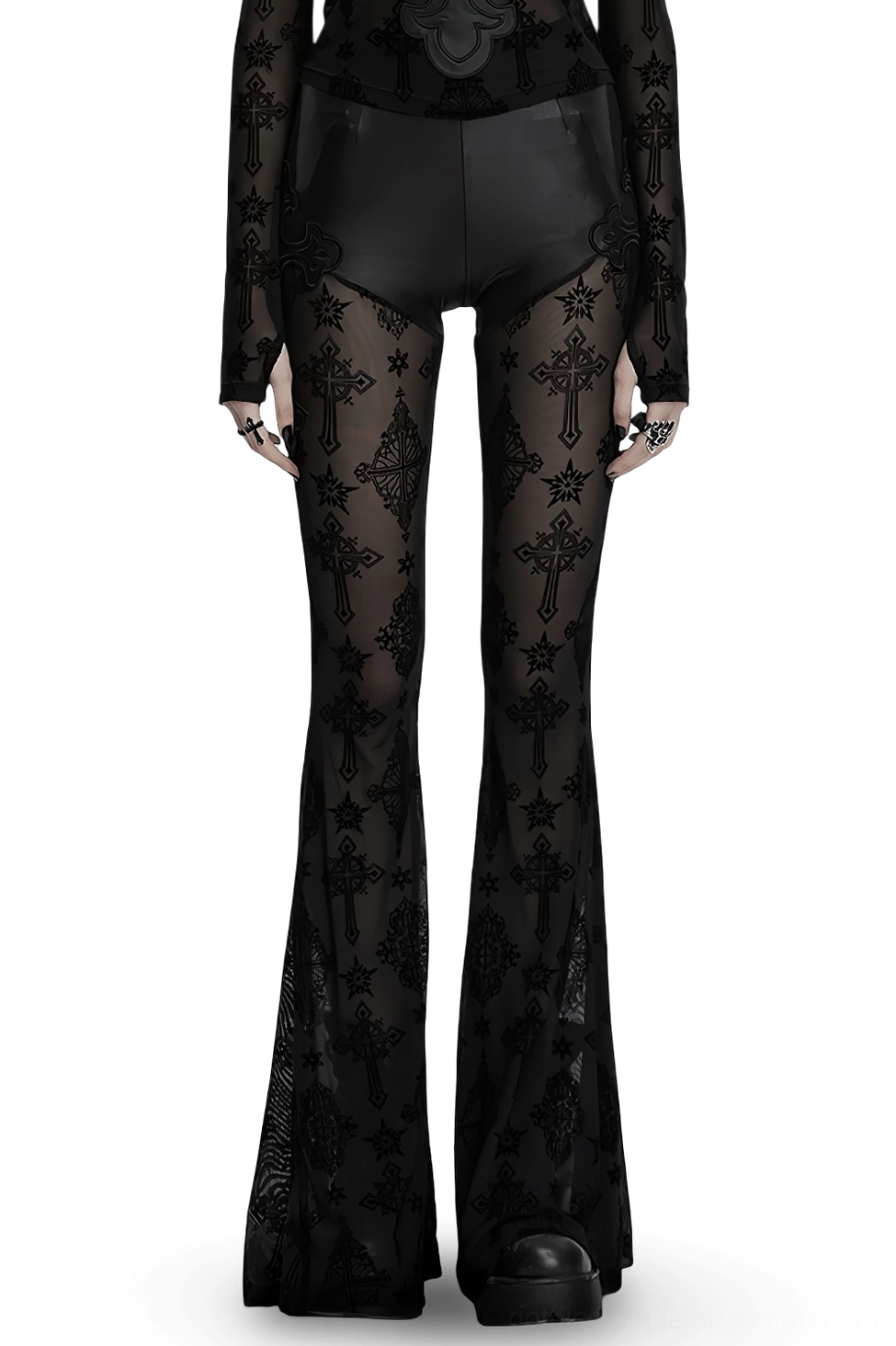 Gothic cross flocked mesh flare pants front view on model - black faux leather waistband with sheer embroidered mesh legs