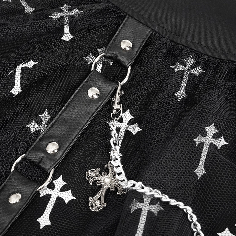 Full-length styling shot of black gothic cross print skirt worn with lace-up goth top, wrist accessories, and platform boots - front three-quarter view
