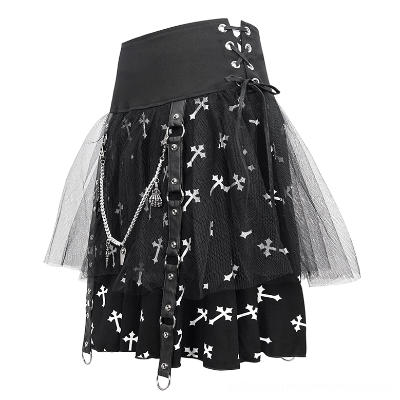 Side close-up of black gothic cross print skirt highlighting lace-up waist, chain decorations, leather accent straps, and mesh overlay texture