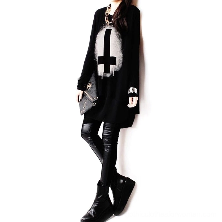 Cross print gothic chiffon tunic top styled with black leather pants and studded accessories, full body side view, casual goth outfit