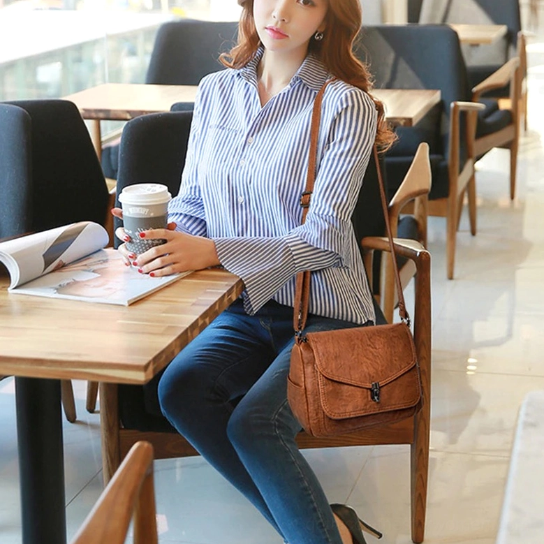 Gothic crossbody handbag material close-up, soft PU leather texture and quality