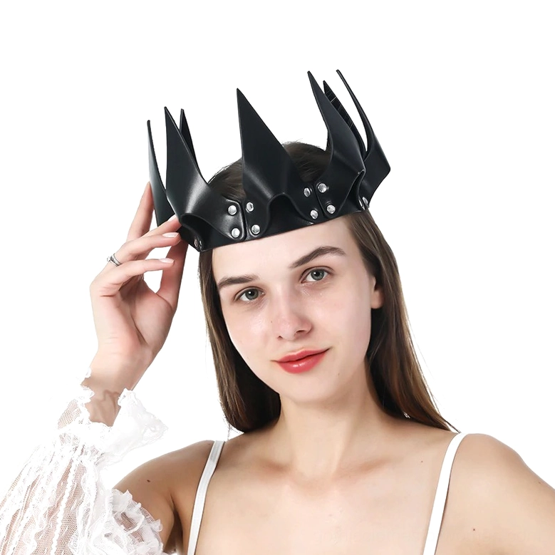 Model adjusting black gothic crown with adjustable strap detail visible, wearing lace sleeve, three-quarter angle showing crown fit and construction