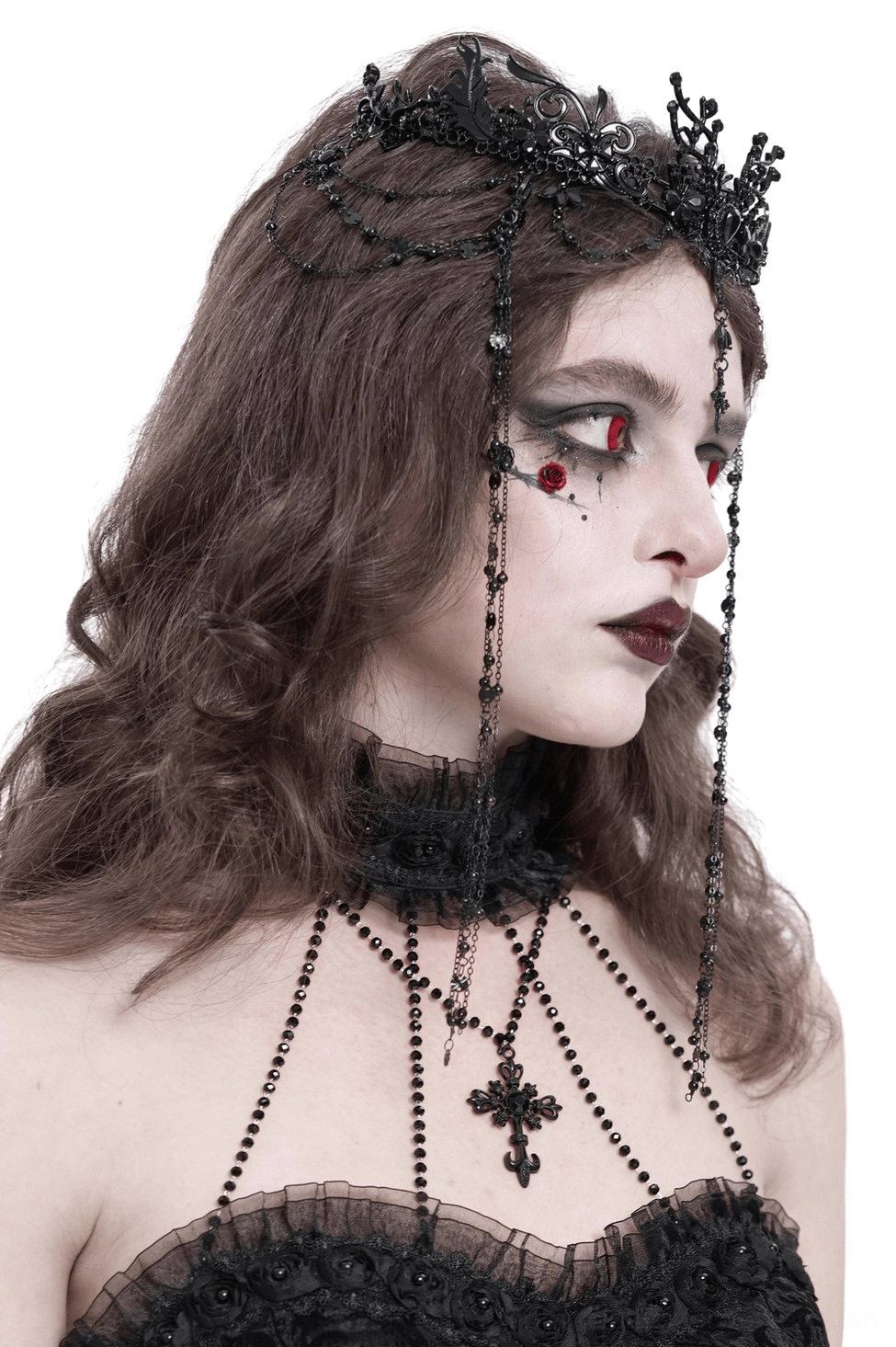 Side profile of gothic black lace crown with long cascading beaded forehead chains on female goth model