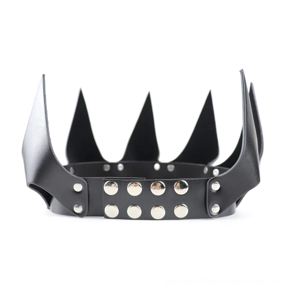 Overhead side view of black gothic spike crown showing PU leather material quality, silver round rivet placement, and three-dimensional spike structure