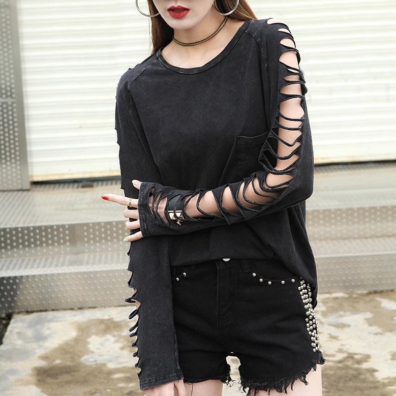 Front upper body view of black gothic long sleeve tee featuring fingerless cutout sleeves with studded accessory styling