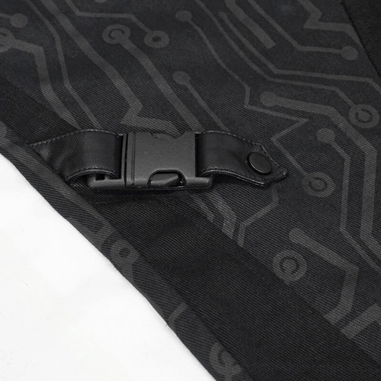 Black plastic buckle and circuit printed strap fastener detail on gothic cyberpunk pants