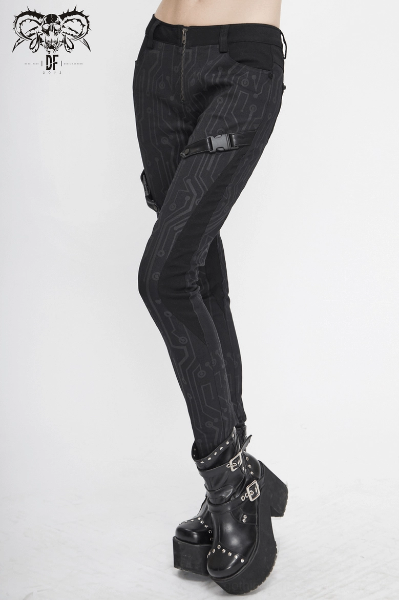 Three-quarter view styling of black circuit printed gothic cyberpunk skinny pants
