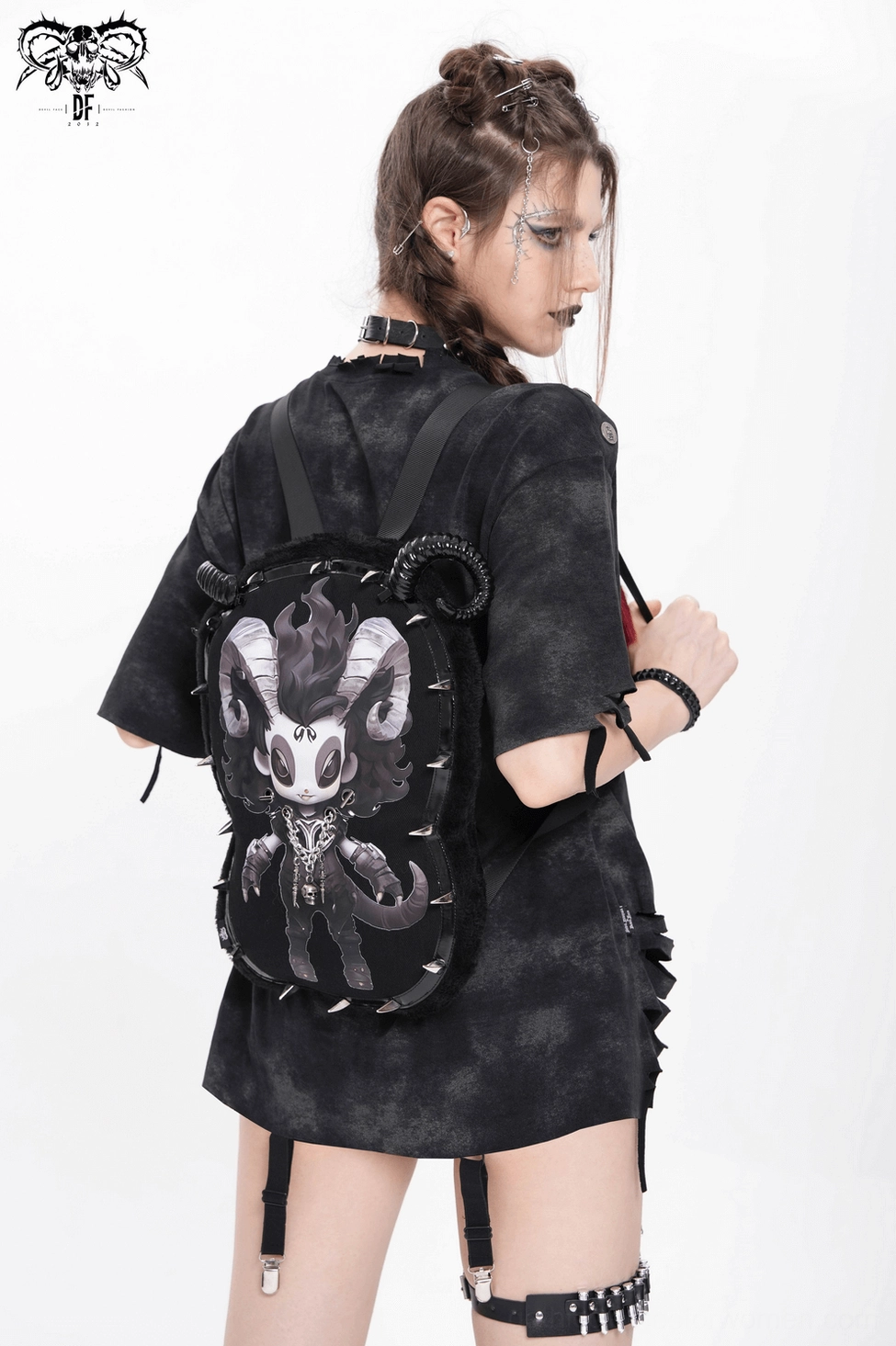 Primary product image of gothic demon backpack with ram horns and metal spike accents in black fleece
