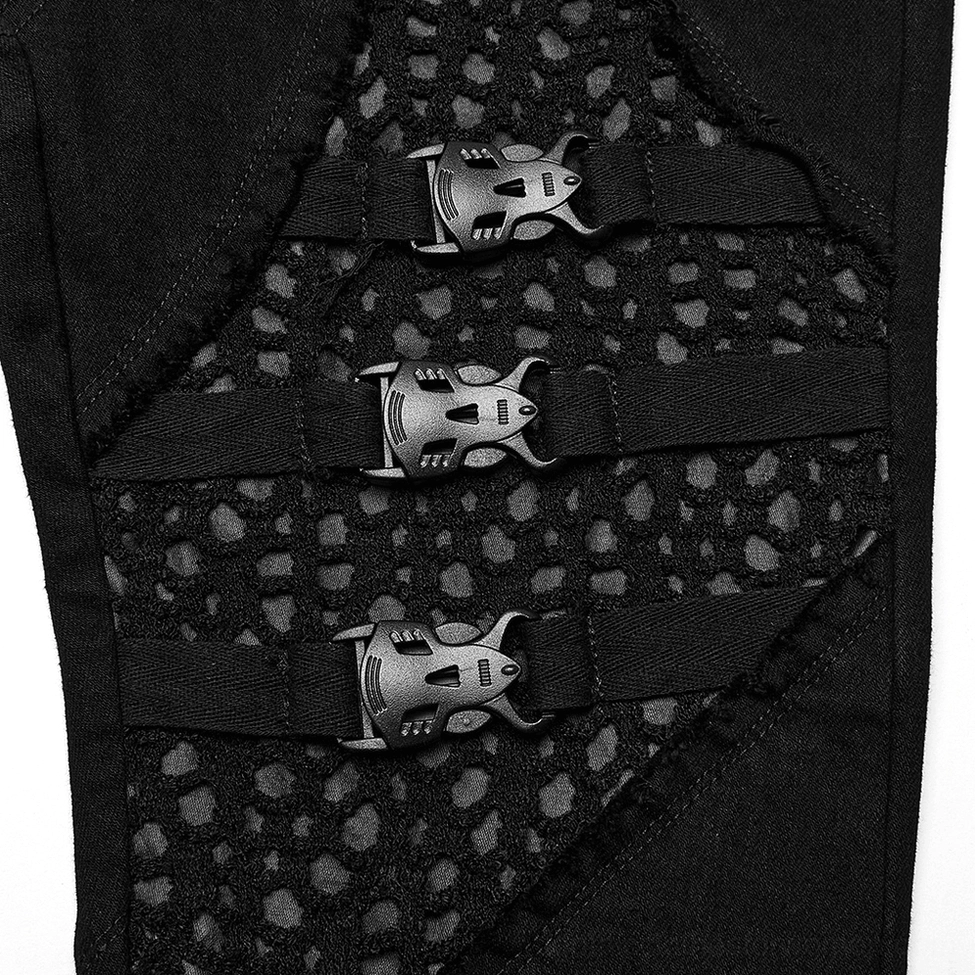 Metal gothic buckle and perforated mesh panel hardware detail on black denim flares