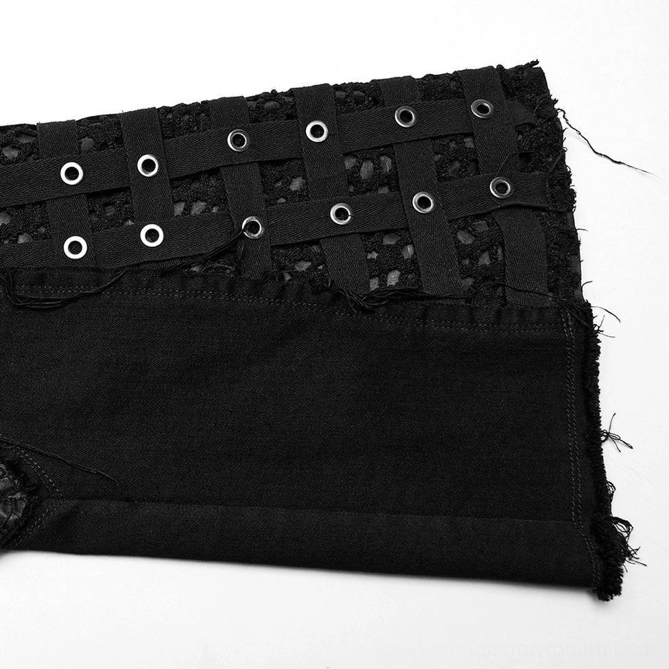 Close-up detail of woven eyelet webbing straps and metal eyelets on gothic denim flares