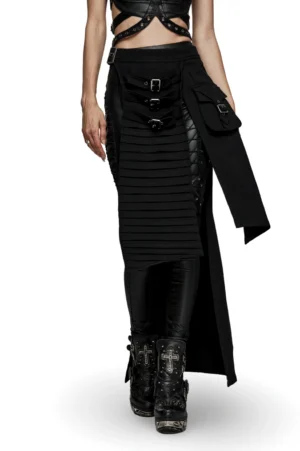 Black asymmetrical gothic maxi skirt with metal buckle accents, front three-quarter view showing pleated panel and adjustable wrap design