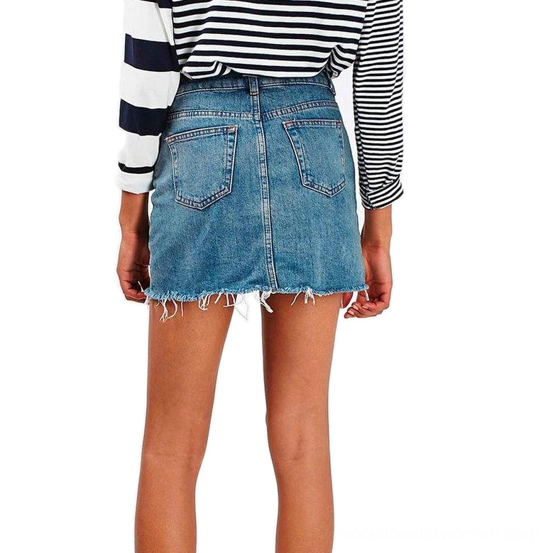high-waist denim mini skirt back view showing dual pockets and raw hem detail alternative fashion