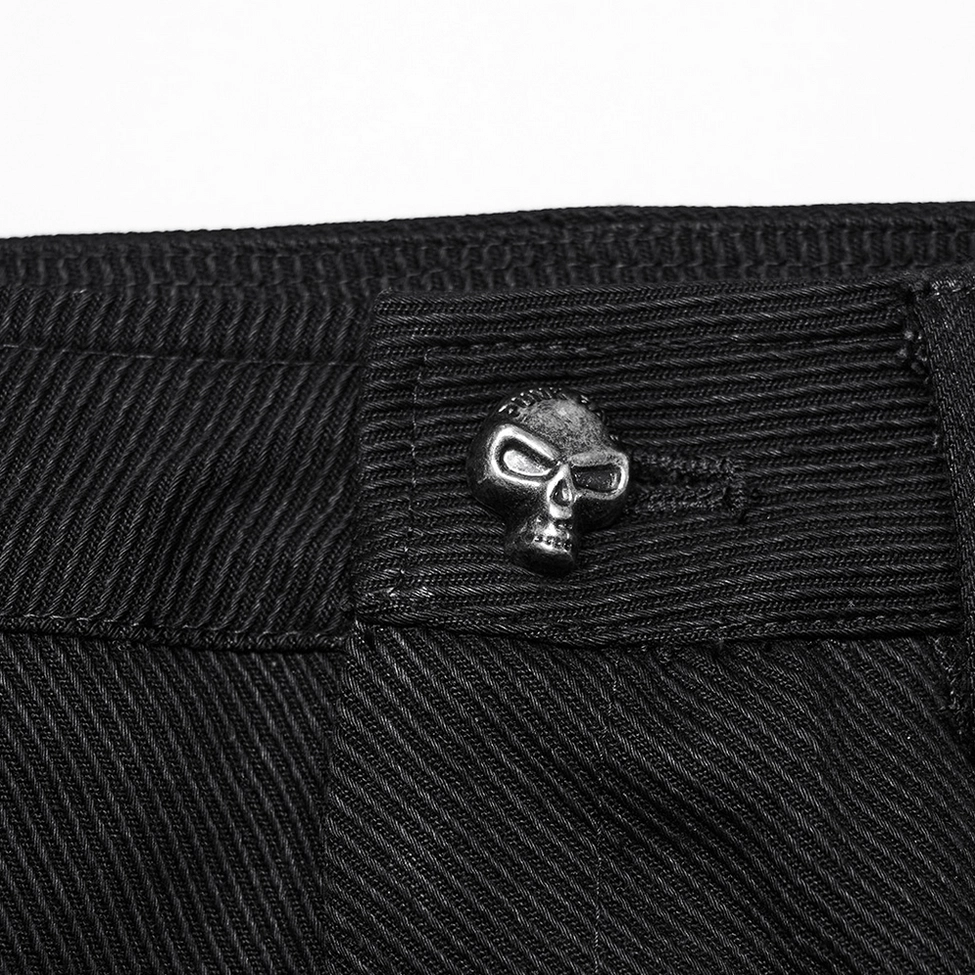 Waistband hardware detail, skull-shaped button, denim twill texture, gothic metal accent close-up