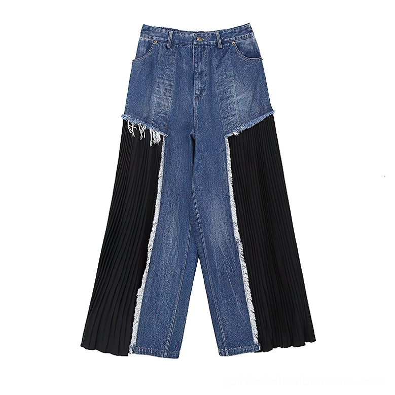 Flat lay of gothic patchwork high-waist wide-leg denim trousers showing front pockets, waistband, and full garment silhouette