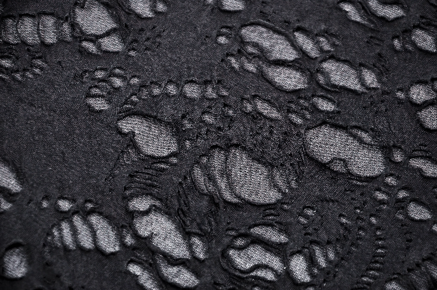 Black distressed skull tank top showing layering potential with mesh
