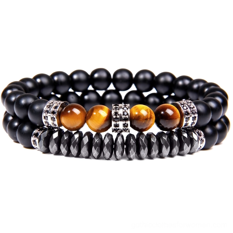 Gothic alternative bracelet with matte black round and flat stone beads, yellow tiger eye, and silver rhinestone spacers
