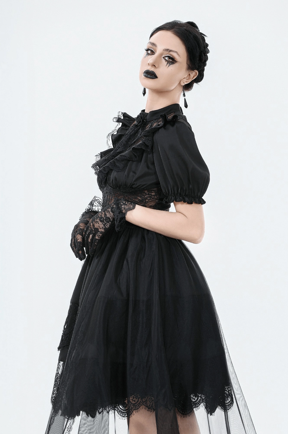 Gothic lace dress styling with alternative accessories and dark aesthetic