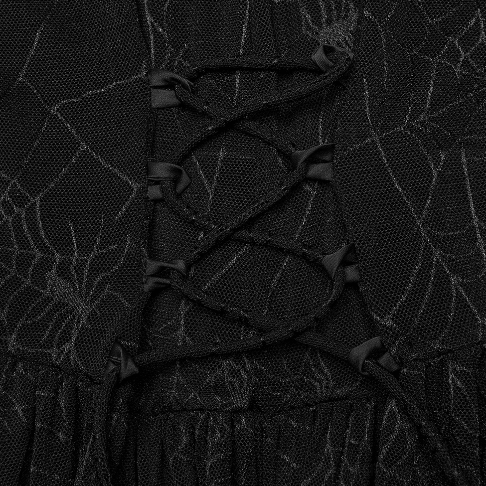 Close-up of gothic dress back showing detailed lace-up corset design with black ribbon laces on spiderweb mesh