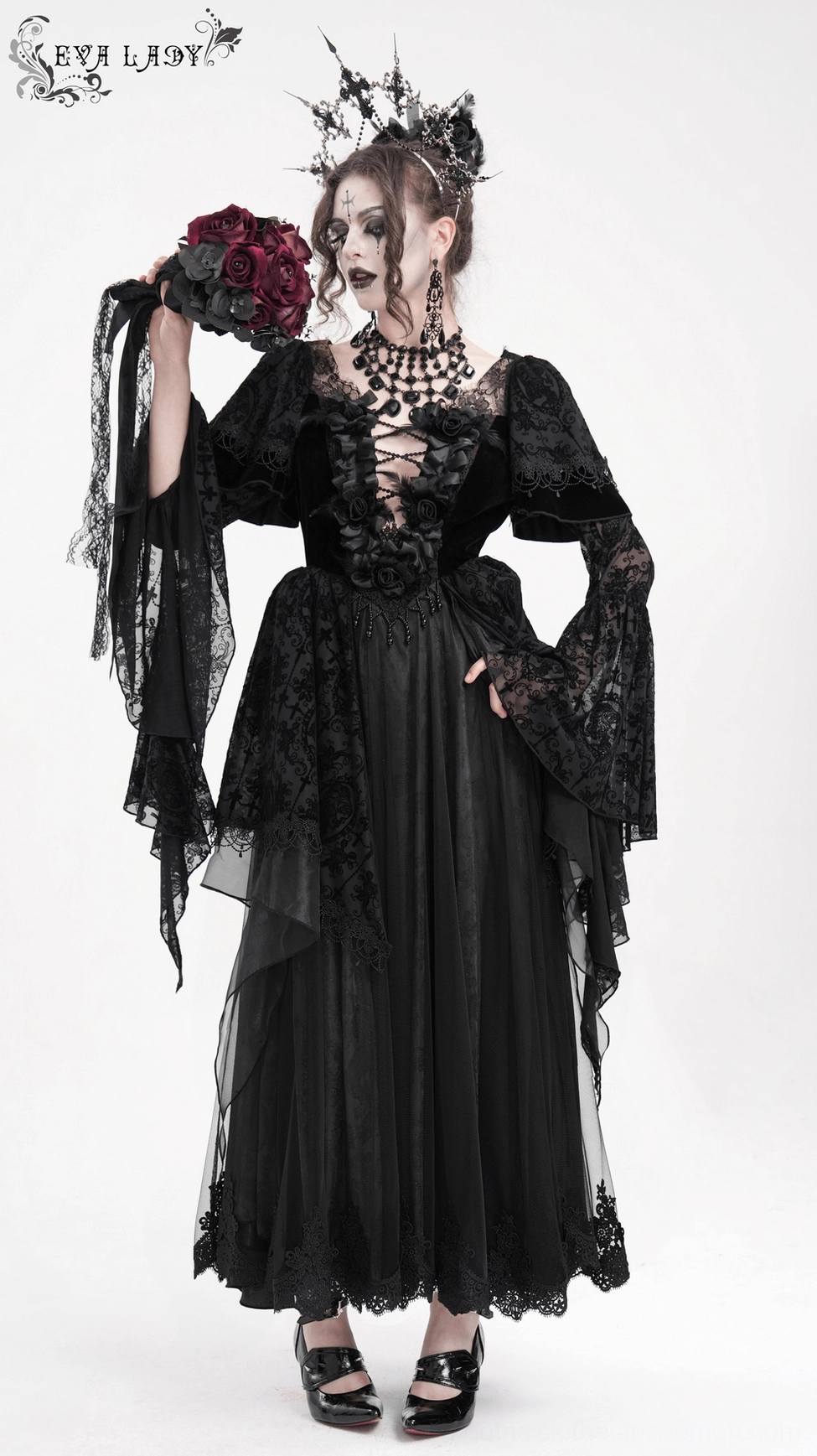 Black gothic lace dress back detail view highlighting lace-up closure, velvet and lace fabric combination, and craftsmanship