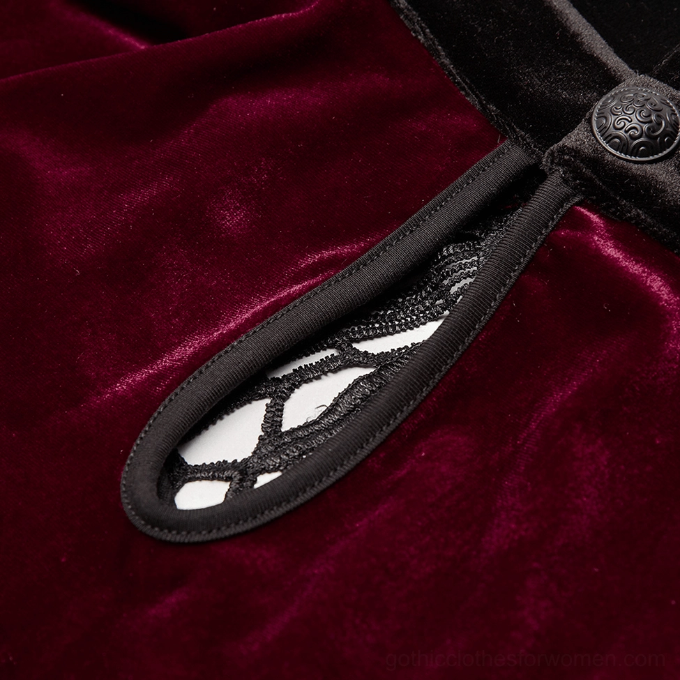Back neck cutout detail on gothic velvet lace-up dress showing lace insert and metal button fastener