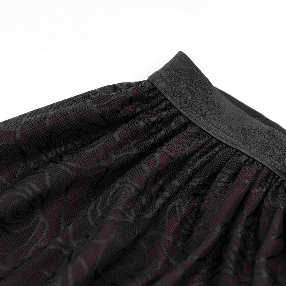 Gothic corset maxi dress close-up showing red beaded chains and rose jacquard fabric with lace trim