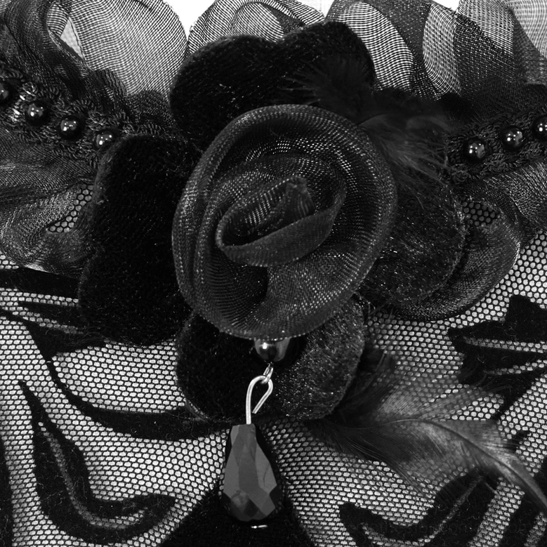 Beaded trim detail macro shot showing round bead embellishment and organza fabric construction