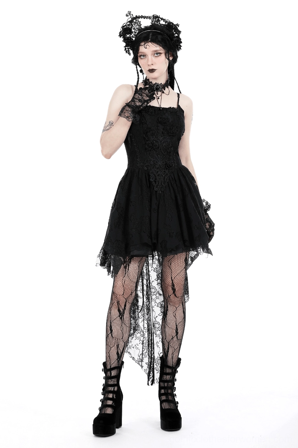 Gothic black lace dress detail highlighting the intricate lace pattern and rose motif design