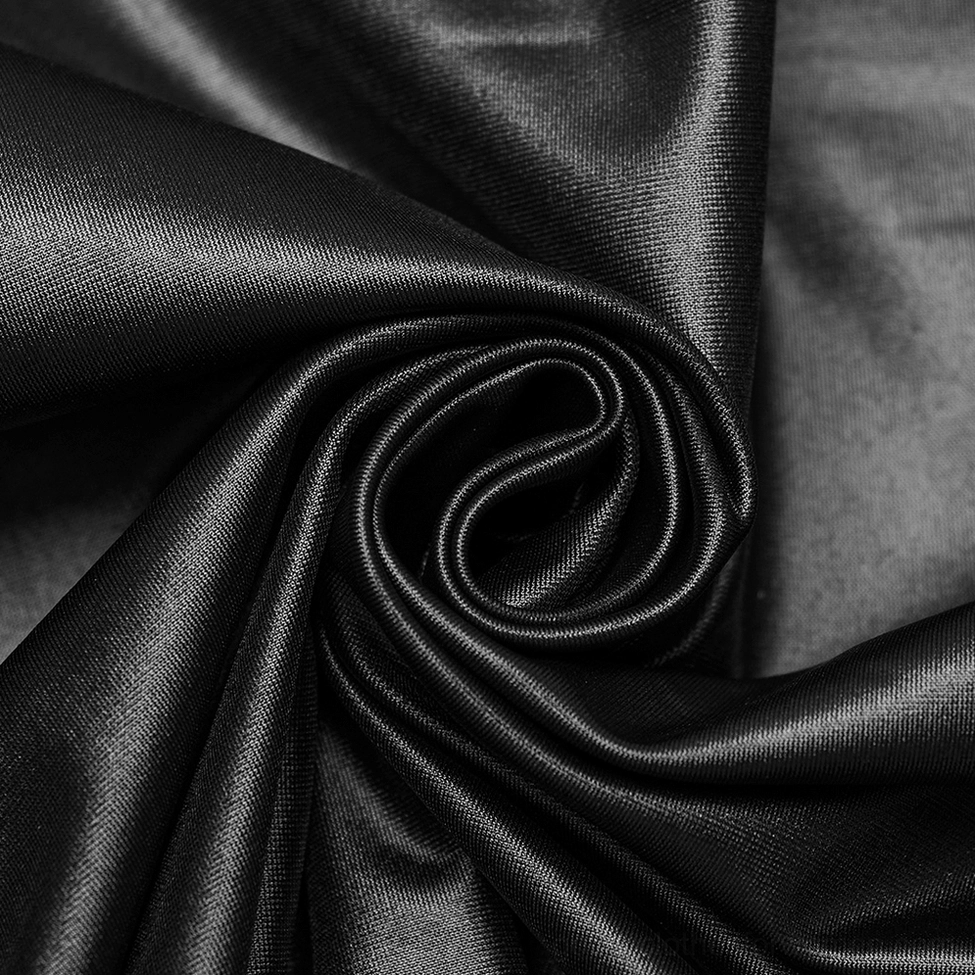 Black satin-like faux leather fabric texture and draped material of gothic maxi dress in close-up