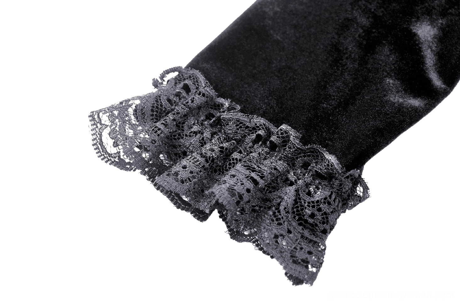 Close-up texture view of luxurious black velvet fabric on gothic midi dress