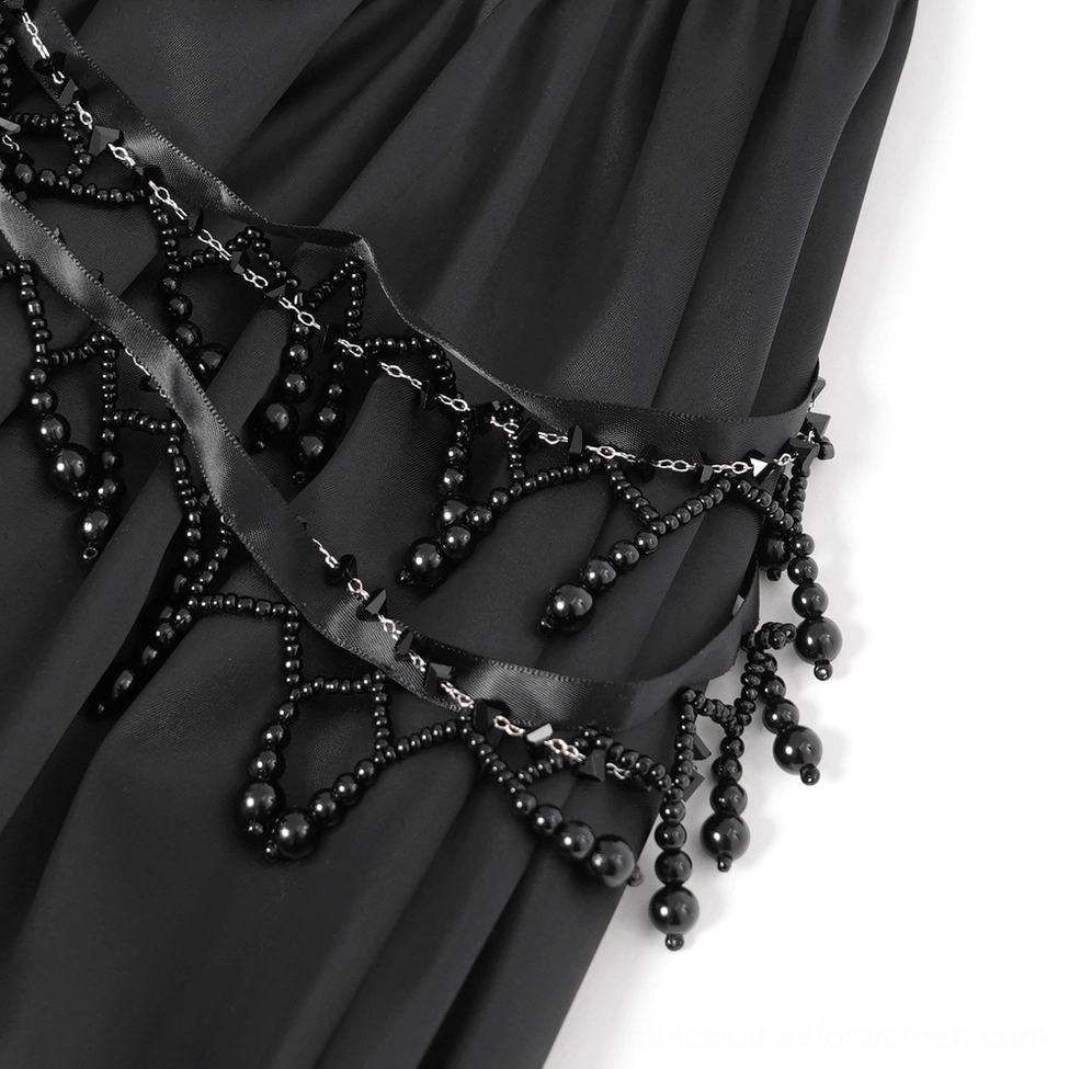 Detailed view of gothic dress bodice featuring beaded lace-up front, ornate corset-inspired closure, and two-tone black burgundy color palette
