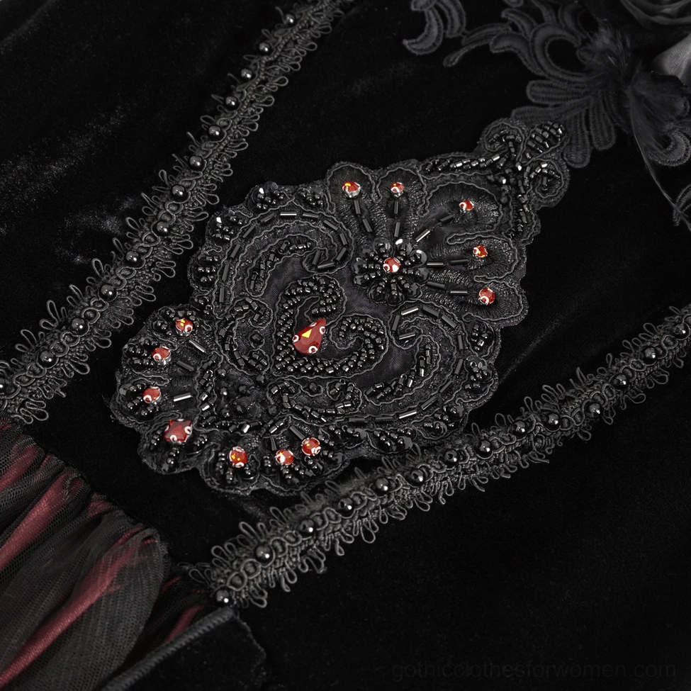 Black velvet gothic Victorian dress detail view of bodice construction with spaghetti straps and lace elements