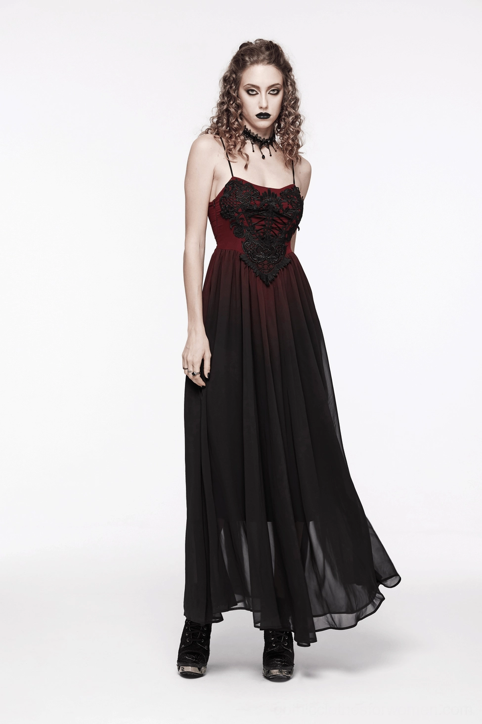 Close-up of sheer chiffon maxi skirt drape on gothic dress with ombre coloring