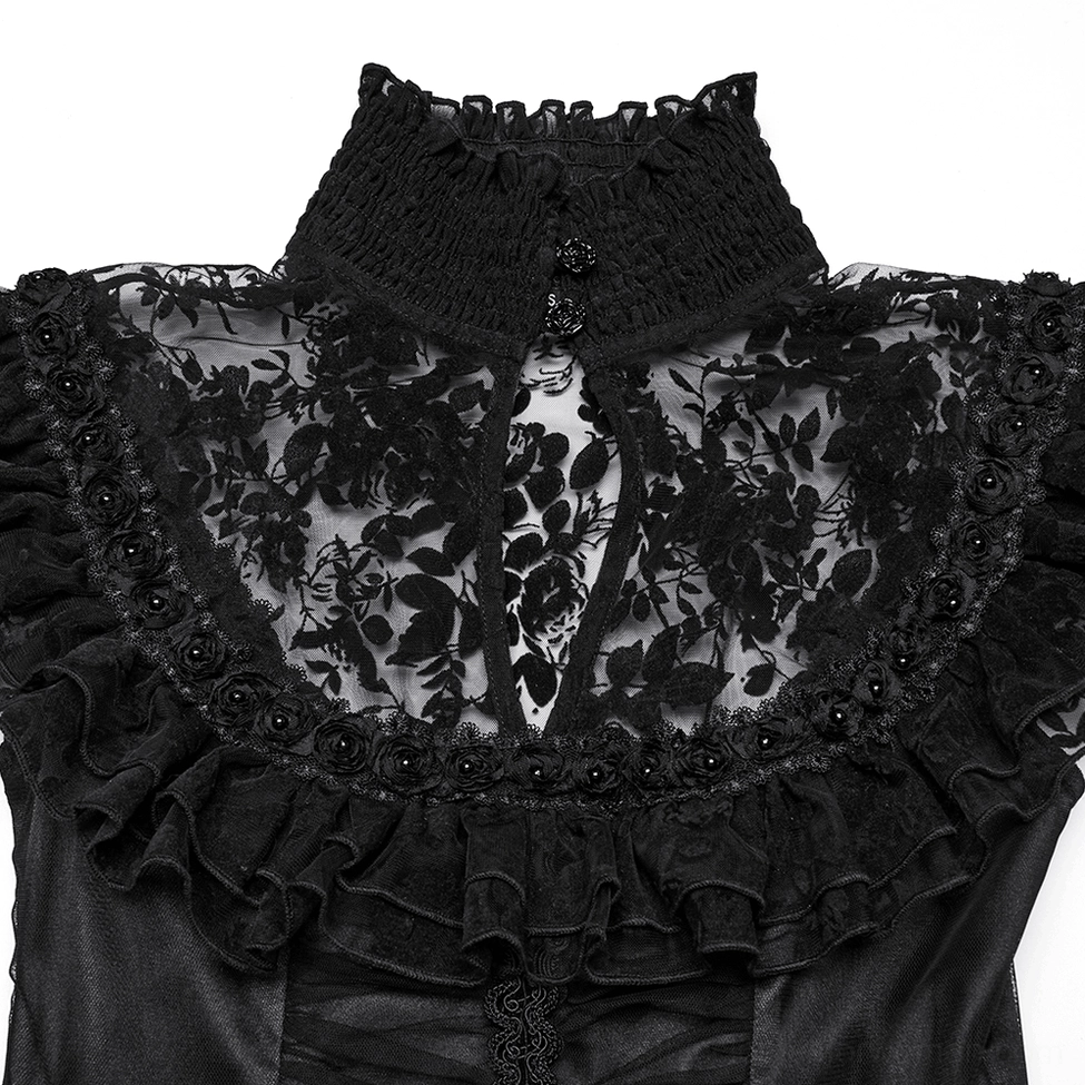 Close-up detail of black gothic dress collar - ruffled high neck with floral lace panel and decorative buttons