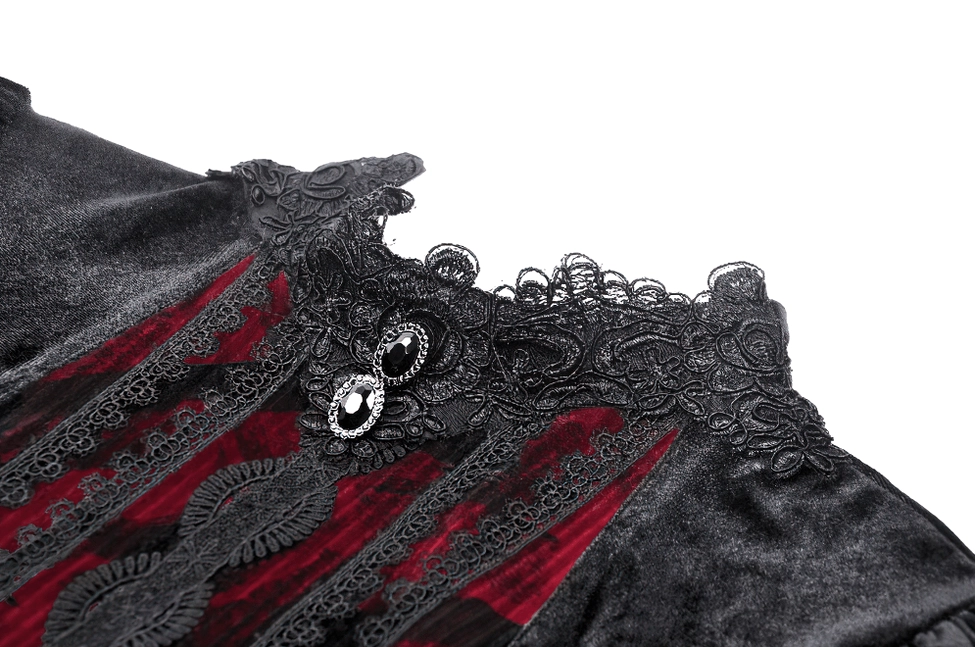 Gothic dress collar close-up showing black lace trim and decorative gem button detail